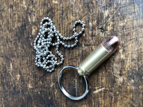 Necklace with bullet 9mm, decoration