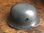 German M16 helmet, miniature with stand