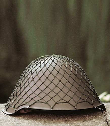 NVA helmet with net cover, used